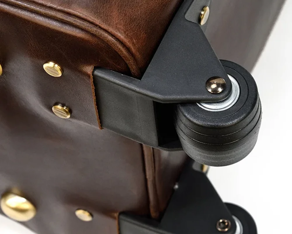 brown leather carry on luggage